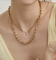 Drehmoment einfache Kreuzhalskette mit Hufeisenschnalle 18 Karat Gold-Edelstahl-Halskette