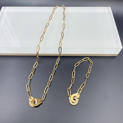 Neueste goldfarbene Ehrringe aus Edelstahl, Halskette, Armband mit Cnc Cz für Damen
